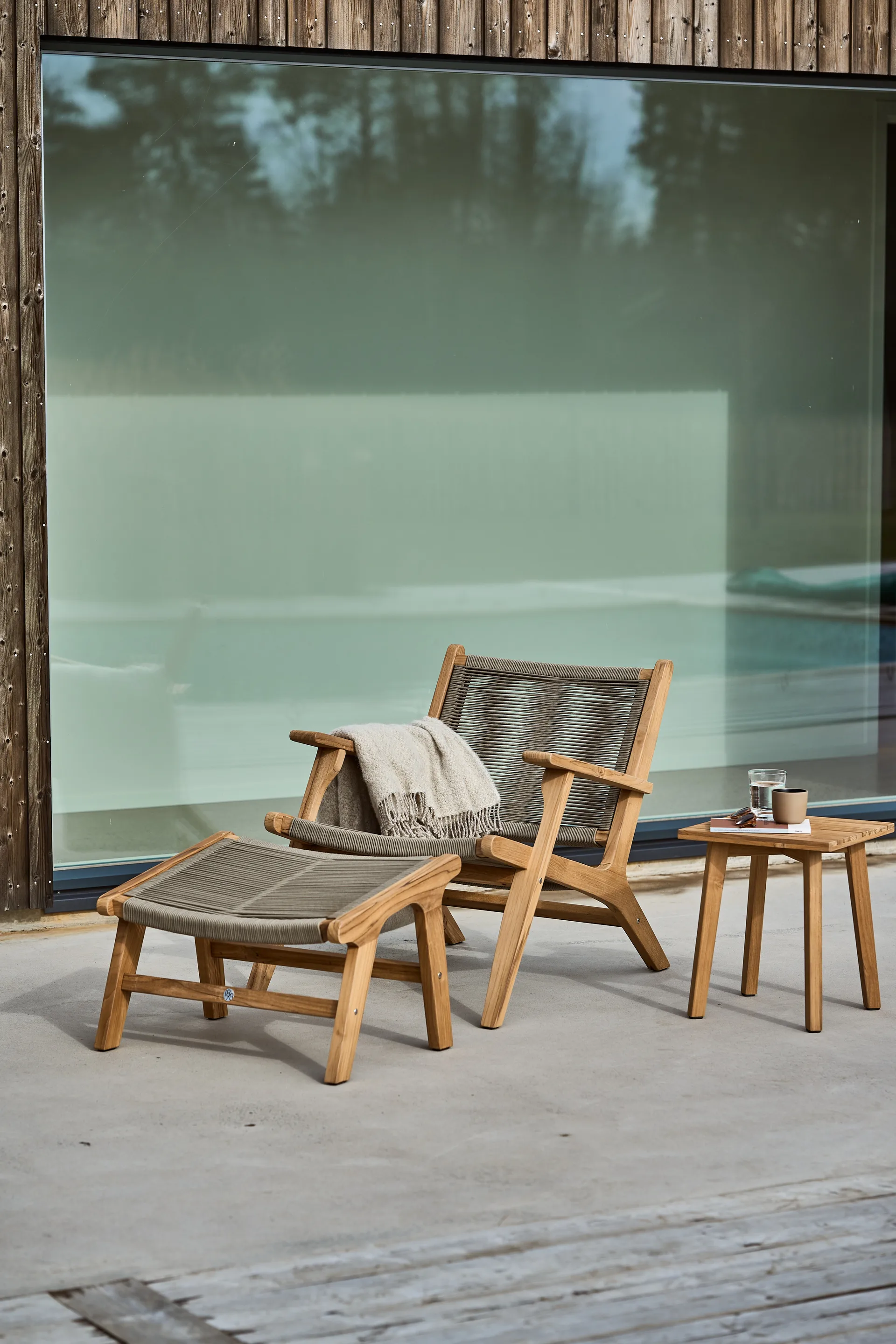 Sandvik voetenbankje, Teak 1898