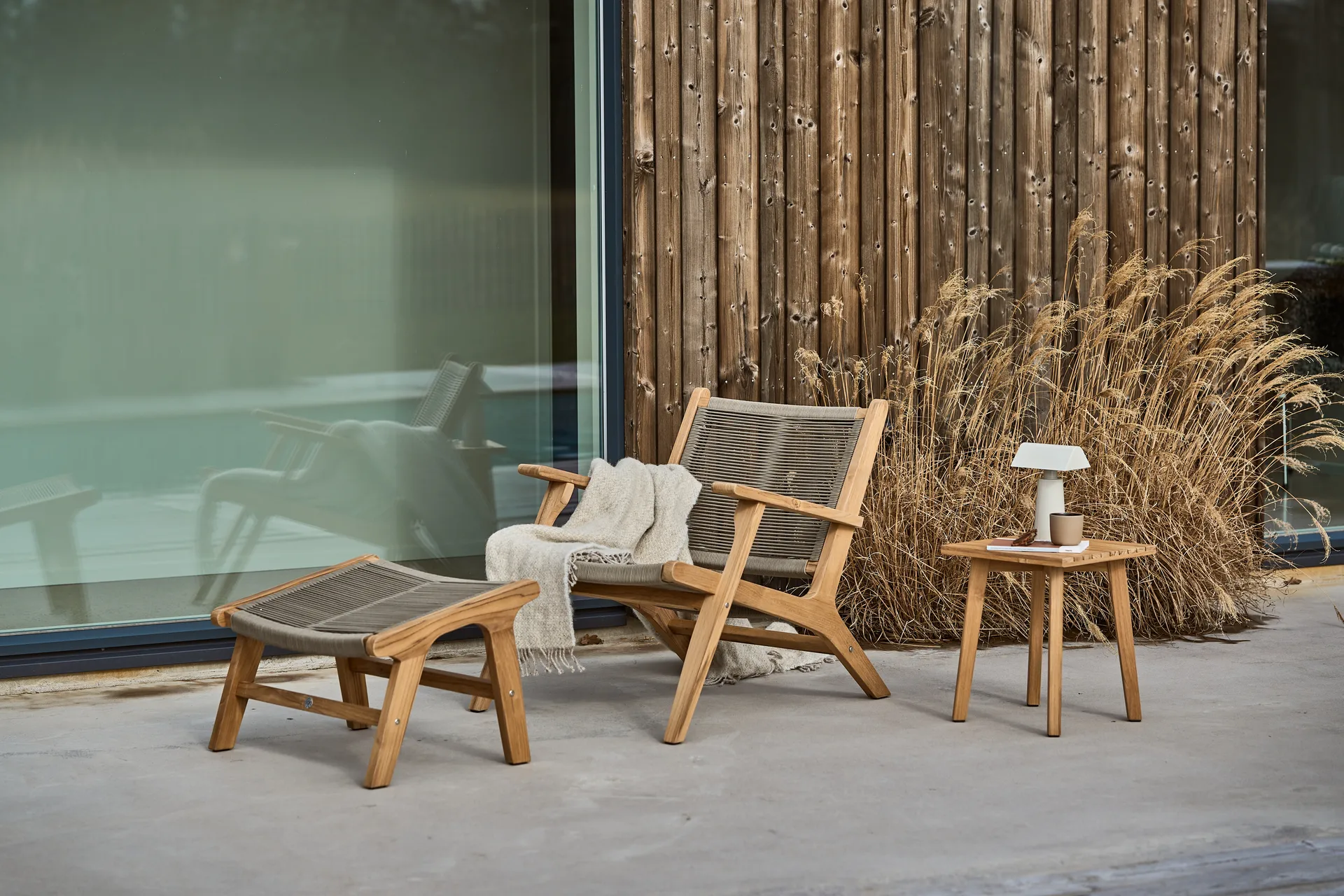 Sandvik voetenbankje, Teak 1898