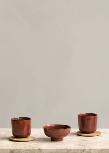 New Norm kom op voet Ø12 cm - Rood geglazuurd - Audo Copenhagen