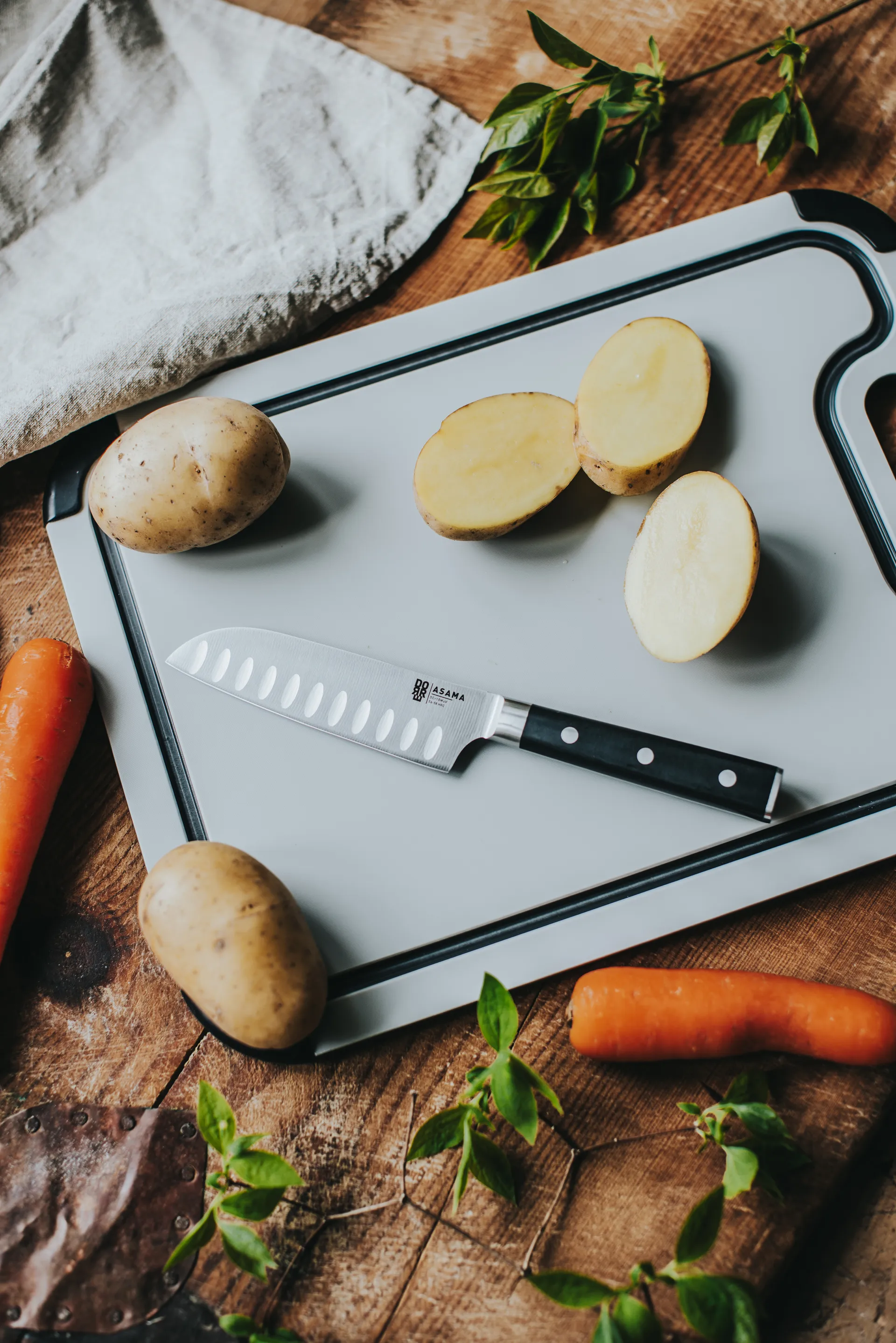 Asama santokumes 13 cm, Zwart handvat Dorre