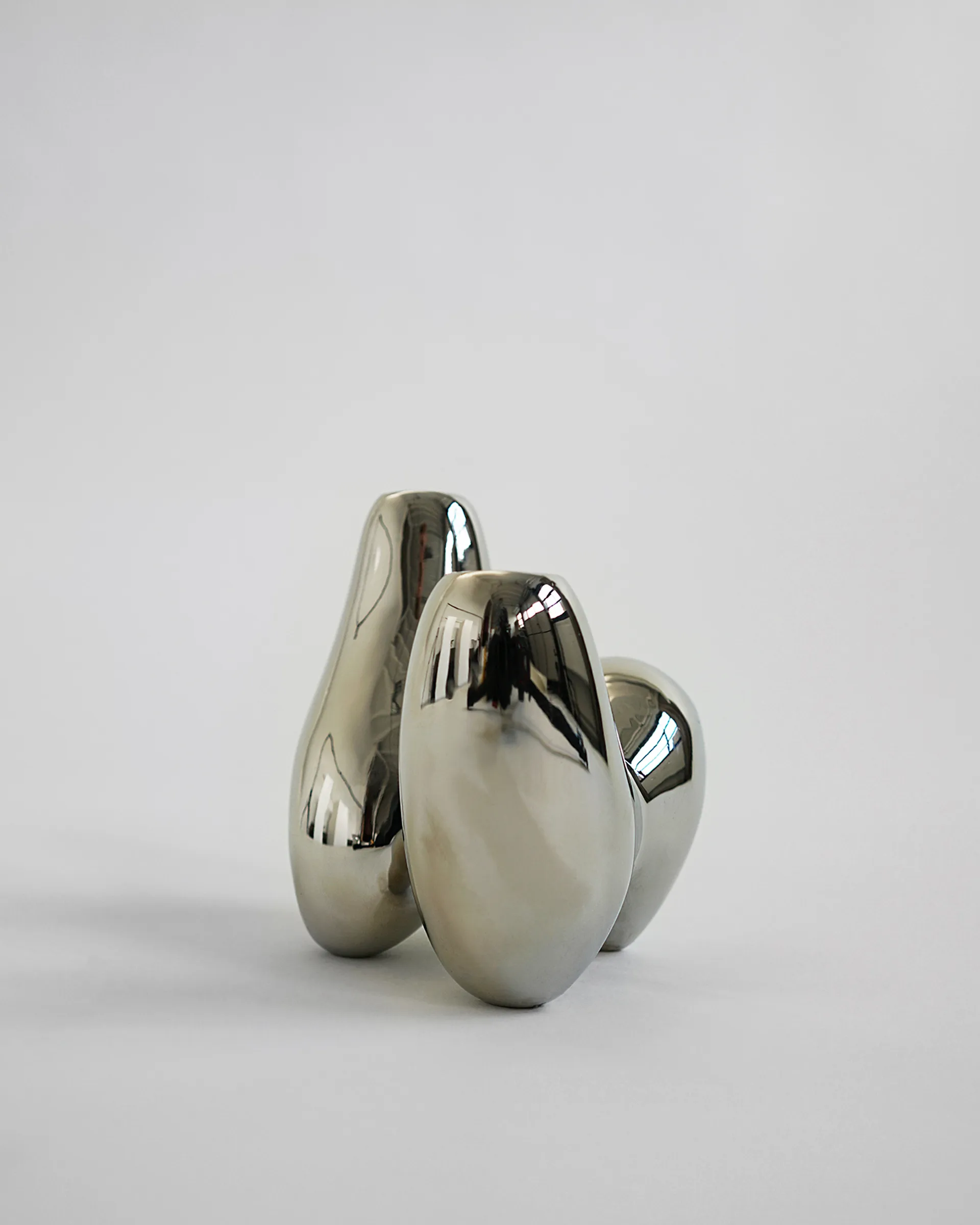 Unity kandelaar, Chrome Hein Studio