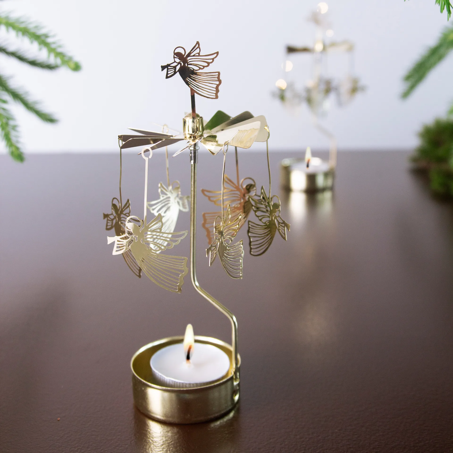 Draaiende waxinelichthouder vliegende engel, Goud Pluto Design