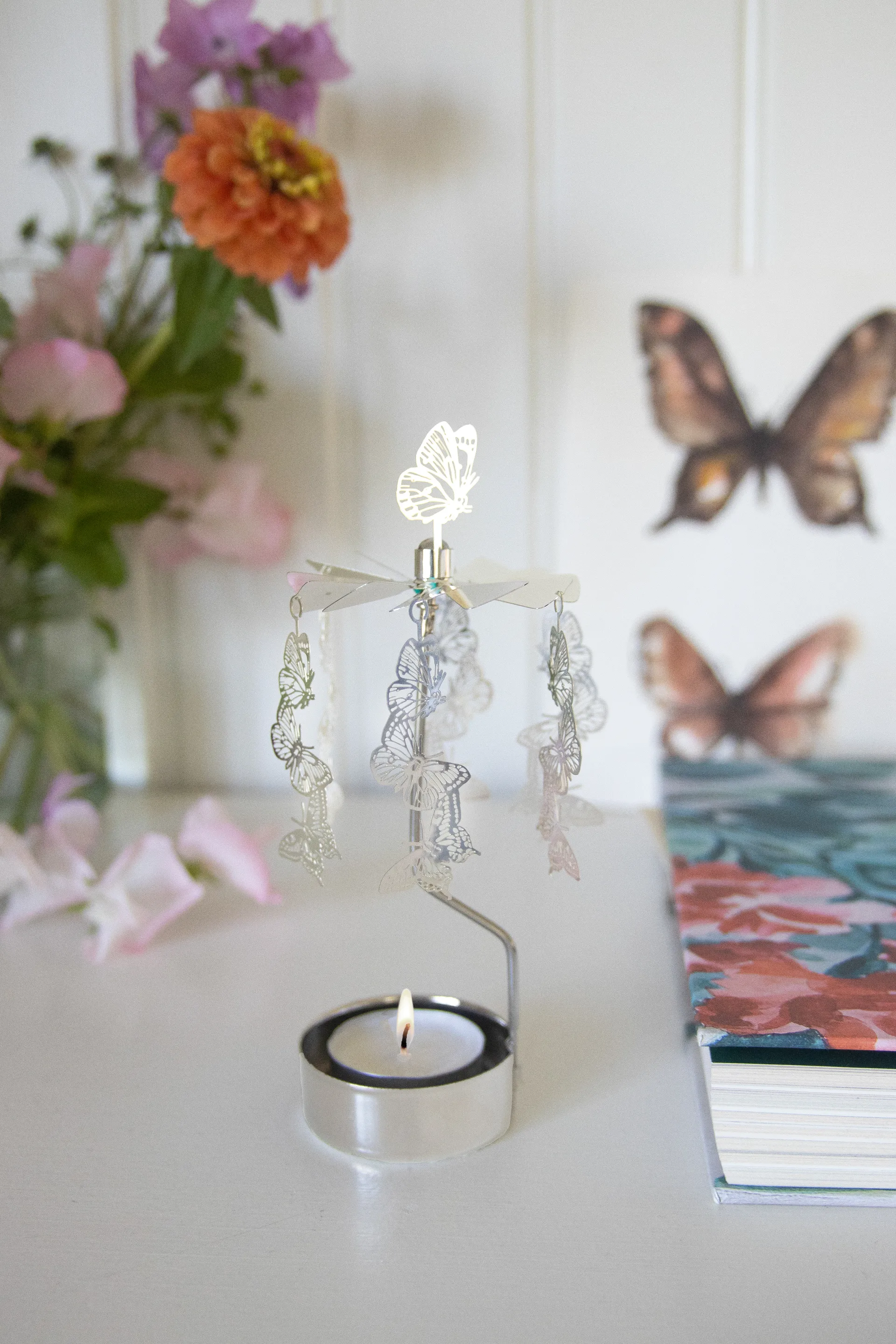 Draaiende waxinelichtjeshouder papillons, Zilver Pluto Design