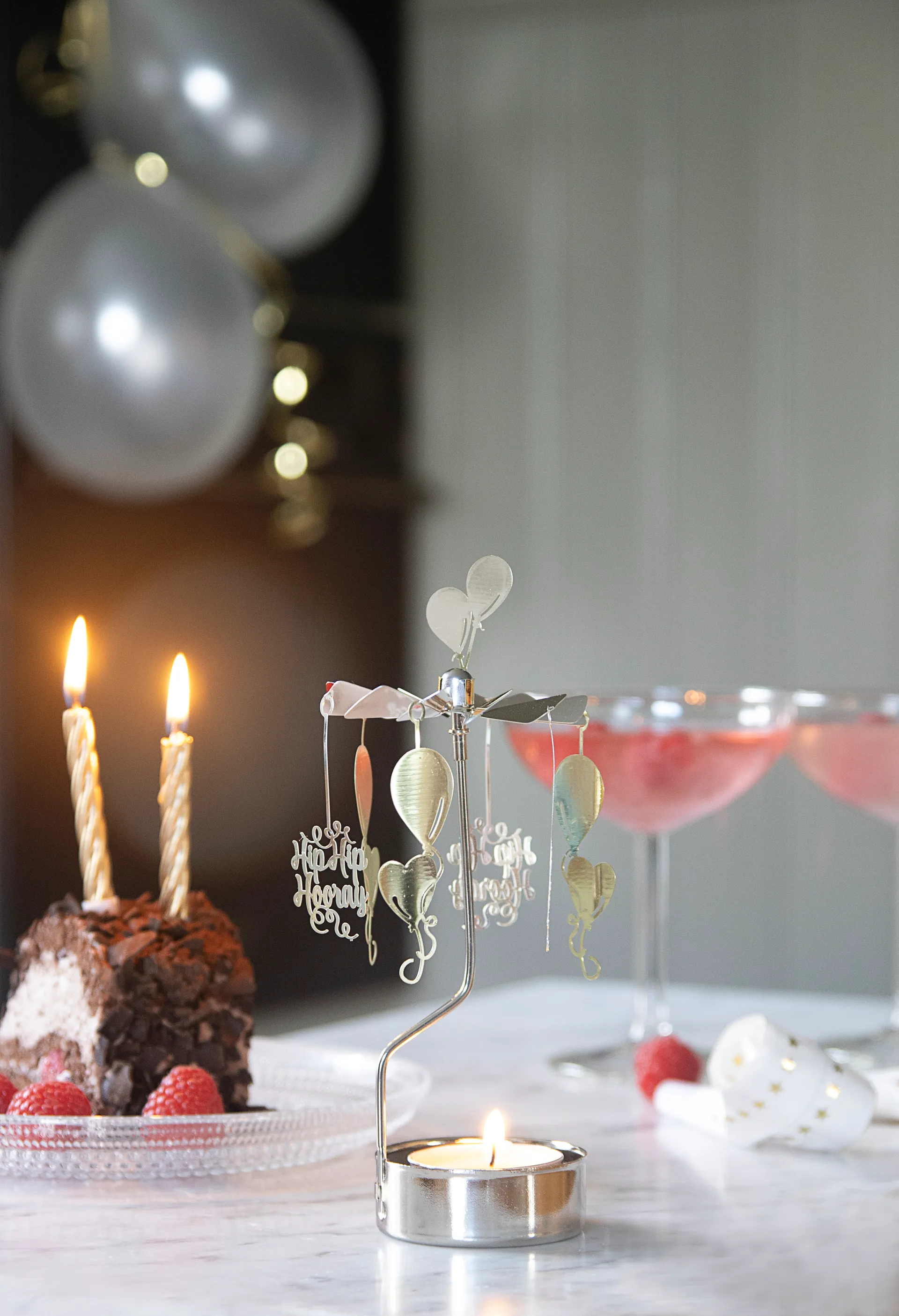 Fira draaiende waxinelichthouder, Zilver-goud Pluto Design