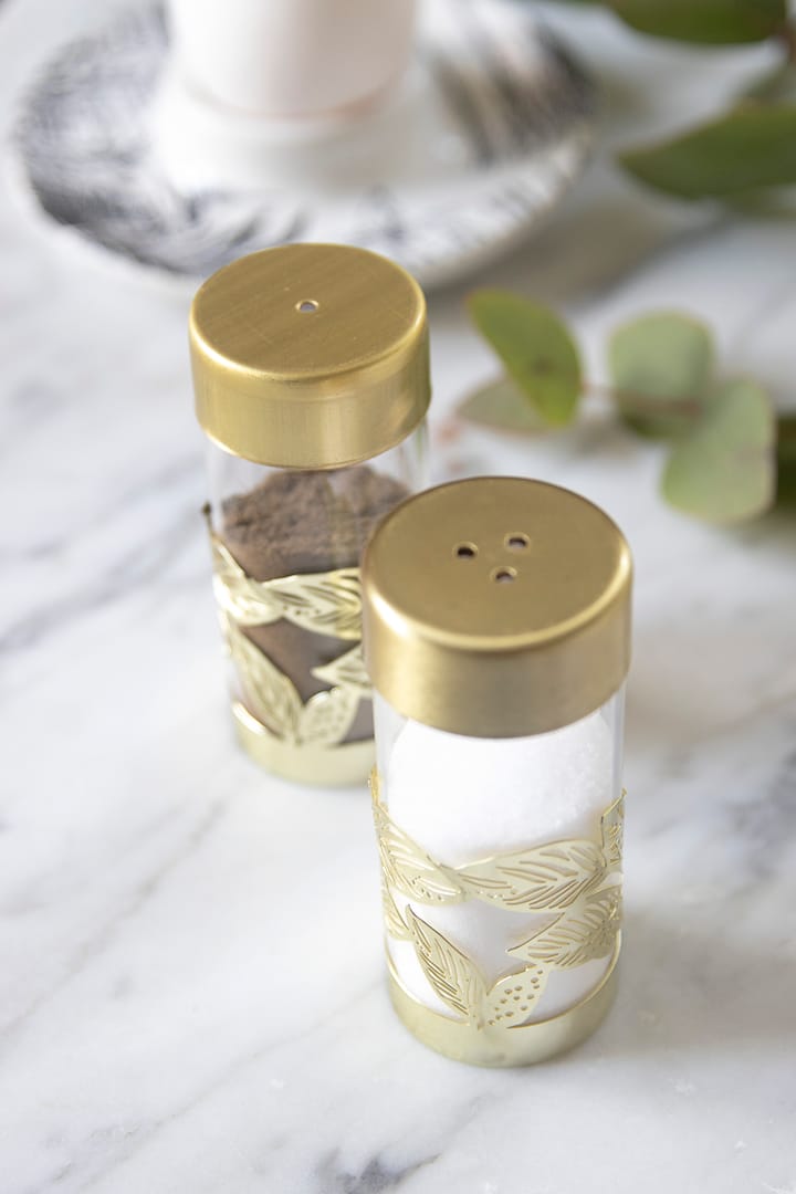 Grönska zout- en pepervaatje, Goud-glas Pluto Design