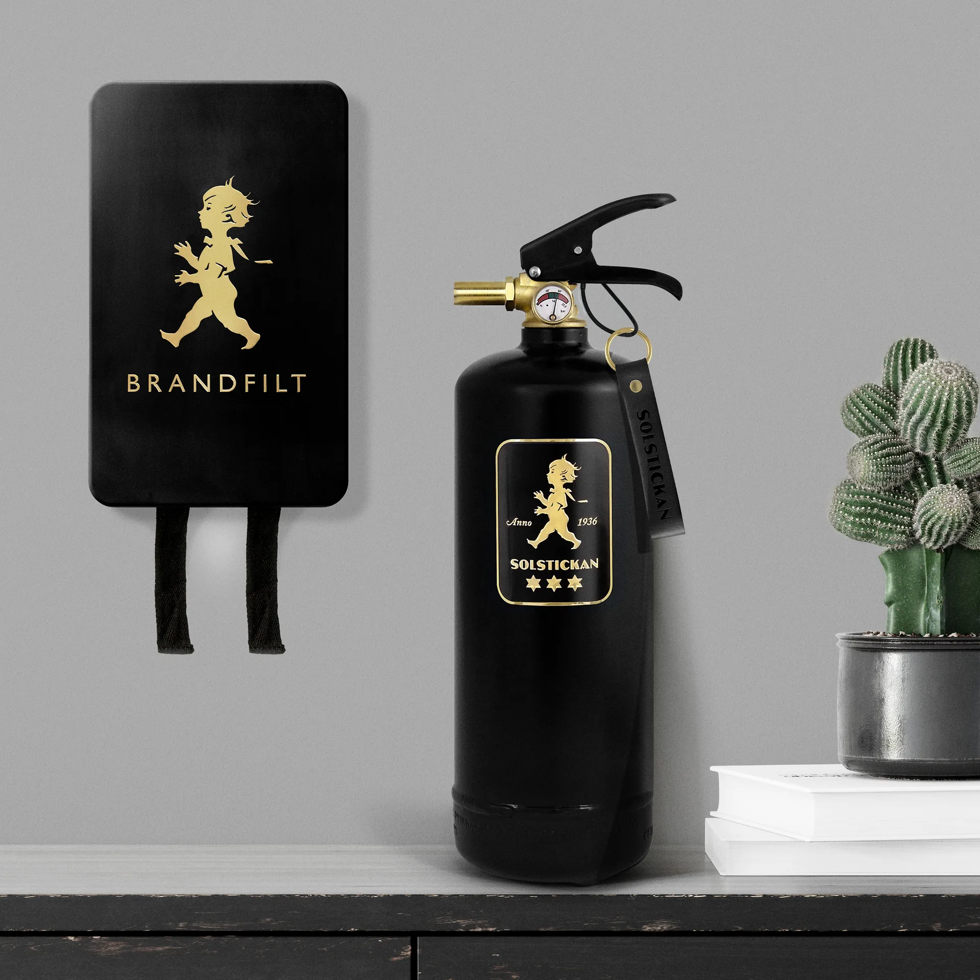 Solstickan brandblusser 2 kg, Zwart-goud Solstickan Design