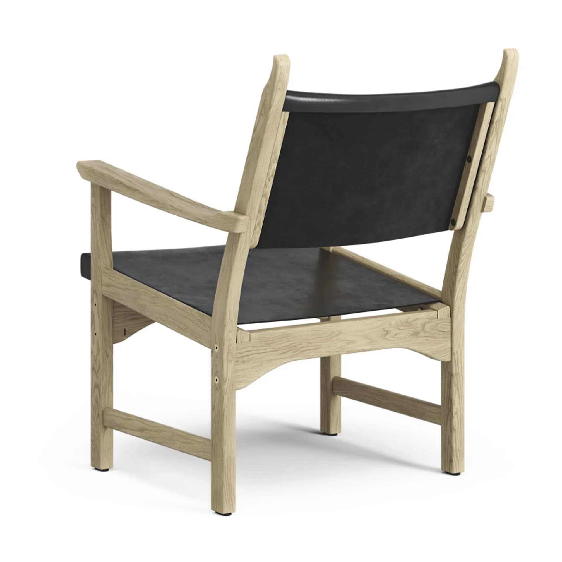 Caryngo fauteuil, Naturelgelakt eikenhout-zwart zadelleer Swedese