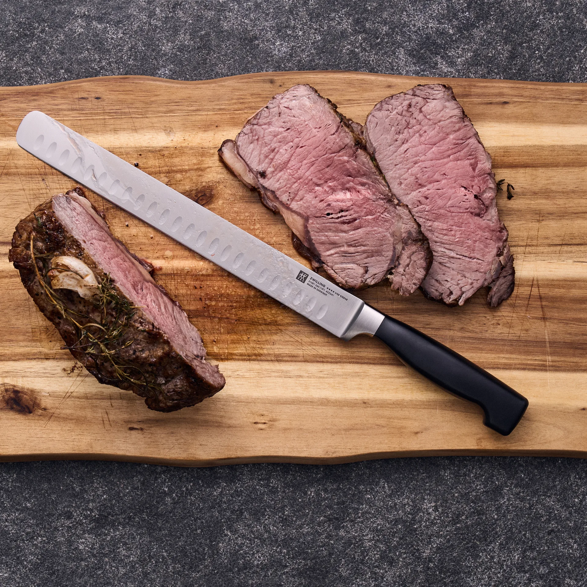 Zwilling Four star fileermes/trancheermes 26 cm, Zwart-roestvrij staal Zwilling